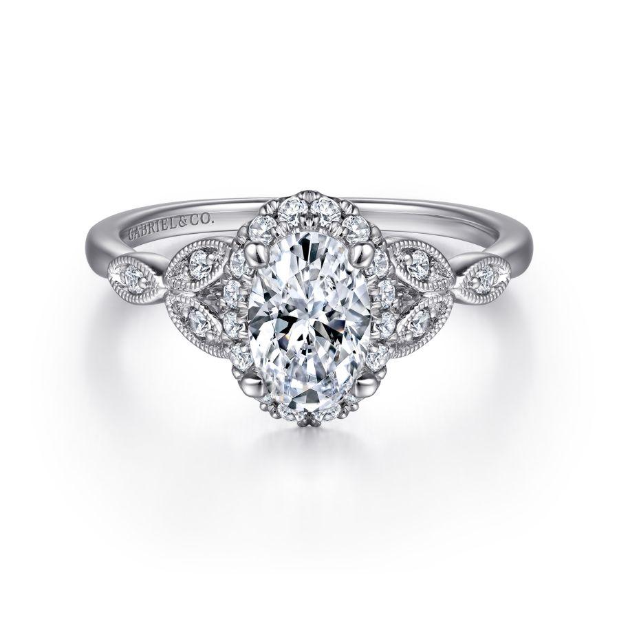 vintage inspired 14k white gold oval halo diamond engagement ring